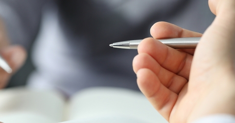 hands with pens
