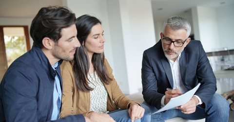 Couple with real-estate agent