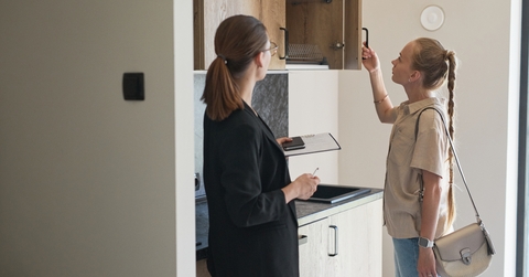Real Estate agent giving apartment tour