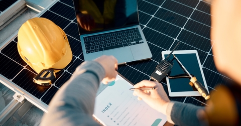 Man with clipboard, planning, updating