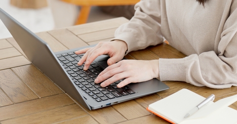 working on laptop