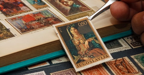 using tweezers above the stamp 