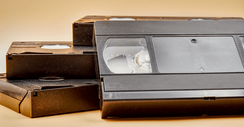 Vintage videotapes on beige background