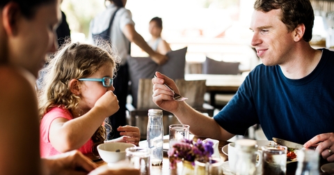 Guests having breakfast at hotel restaurant