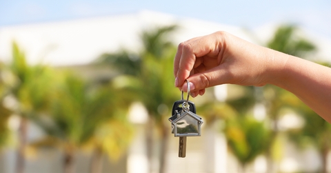 real estate agent holding keys