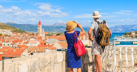 couple of unidentified elderly tourists