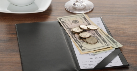 bill with american dollars on table