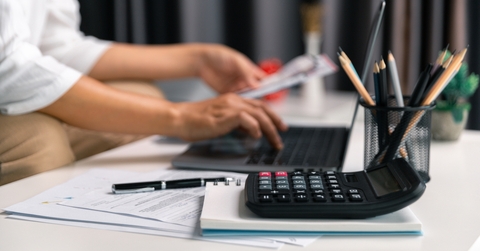 business owner inspecting finance documents