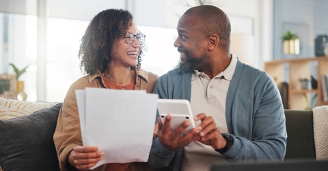 Happy man and woman with paperwork, budget and retirement fund with investment