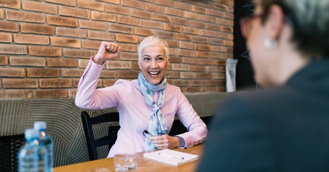 Happy senior woman after successful job interview