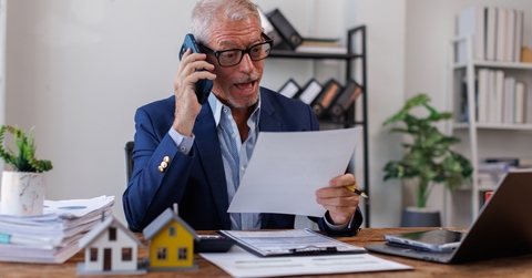 real estate agent making business call 