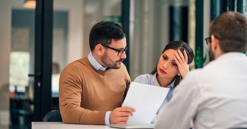 Adviser explaining conditions to a couple