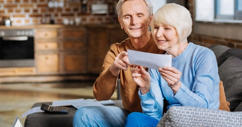 aged couple sitting on the sofa 
