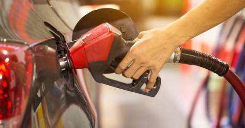 pumping gas at gas pump