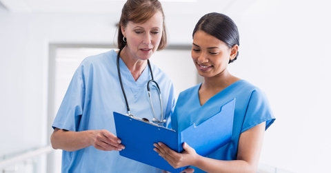 nurse and doctor discussing