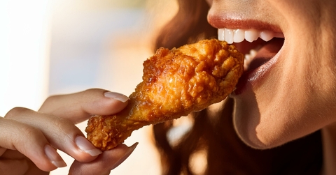 eating a chicken wing