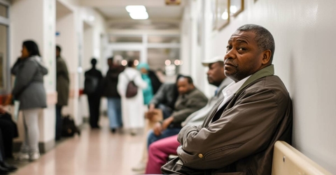 Senior man in waiting room at the bank