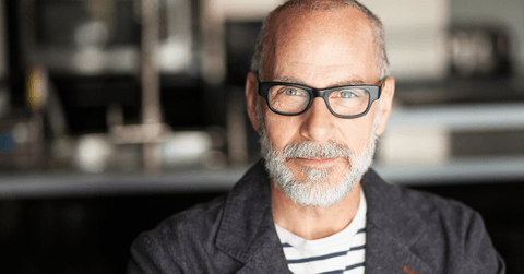 man in his 50&#x27;s with glasses looking into the camera
