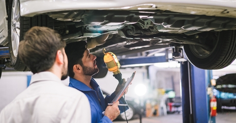 mechanic holding clipboard 