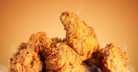 Fried chicken on orange background