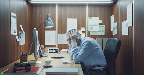 stressed businessman at his office