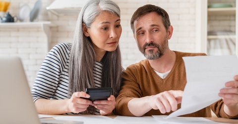 wife and husband family doing paperwork