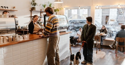 Customer in line and ordering coffee at a coffeeshop 