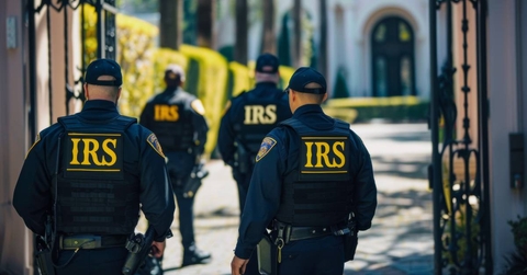 IRS tax agents standing in front of a mansion for a raid