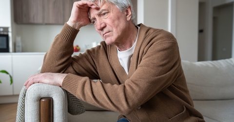 old man with Alzheimer sitting abandoned