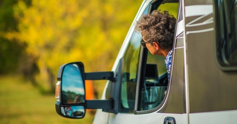 Driver with head out of the window in RV