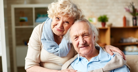 Affectionate elderly couple hugging