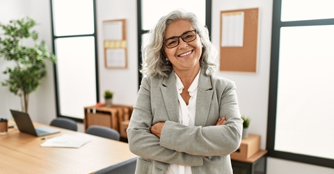 Woman smiling with arms crossed 