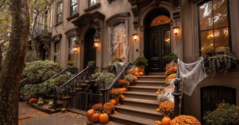 Autumnal Halloween decorations on a historic New York street 