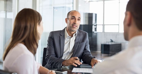 financial advisor with clients