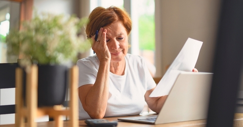 Woman stressed out with bills