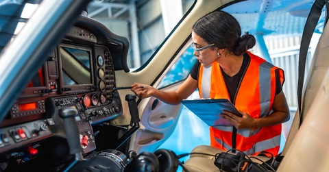 Tech woman inspecting transportation