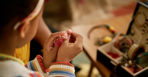 Girl looking at jewelry box