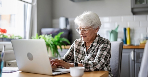 older woman on laptop