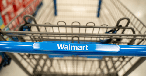 Close up of Walmart shopping cart handle inside store