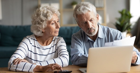 retired couple doing taxes