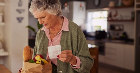 older woman with groceries