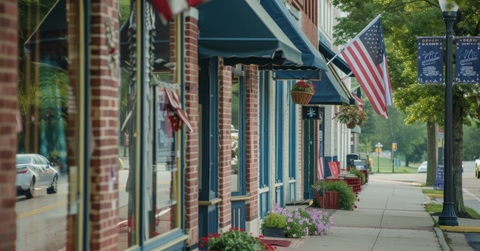A small-town main street lined with storefronts