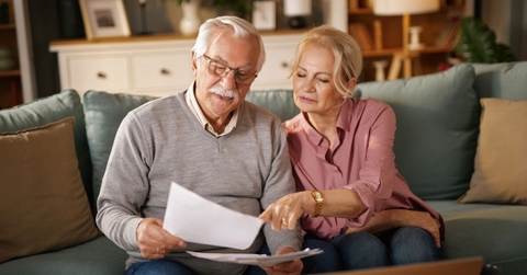 older couple reviewing papers
