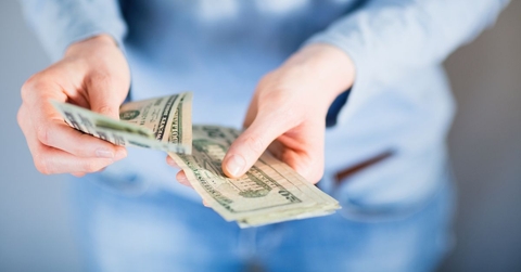 woman counting cash