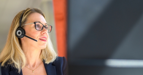 Woman working with headphone on