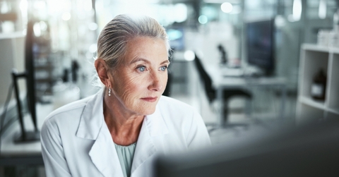 Older woman working in a lab