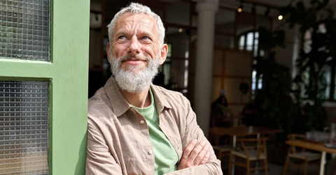 68 year old man at a cafe