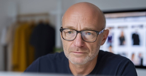 Photo of a 50 year old man wearing glasses