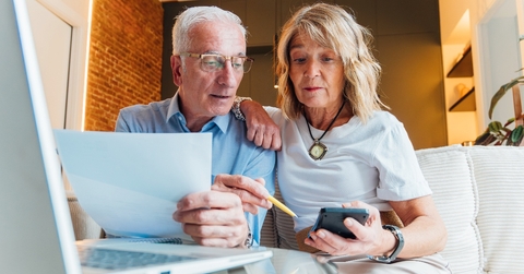 Older couple looking at their finances