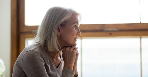 Pensive looking mature woman